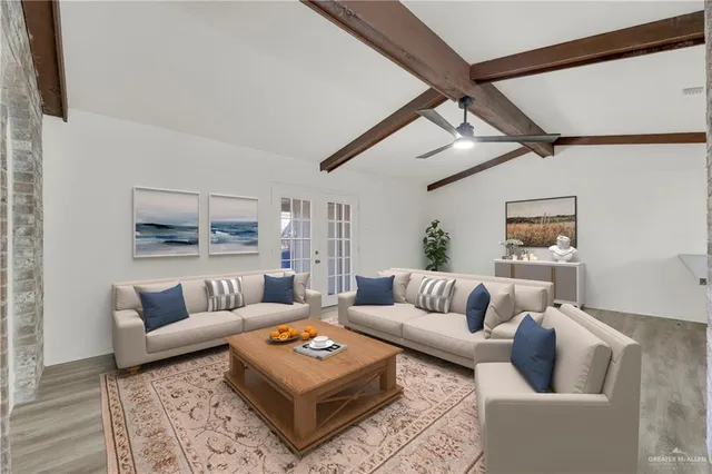 a living room with furniture and a couch