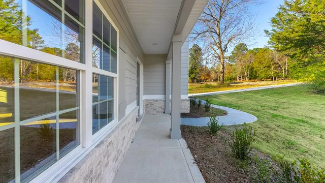 a view of an entryway with a garden