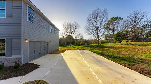 a view of swimming pool with outdoor seating and yard