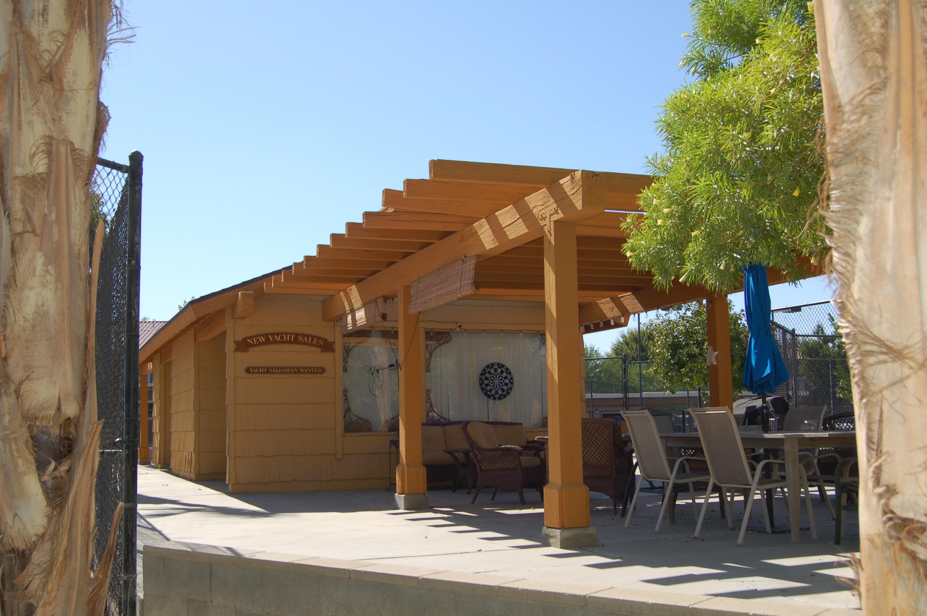 48255 Monroe Street, Unit 6 Indio, CA 92201 - Photo 32 of 43 a front view of a house with garden