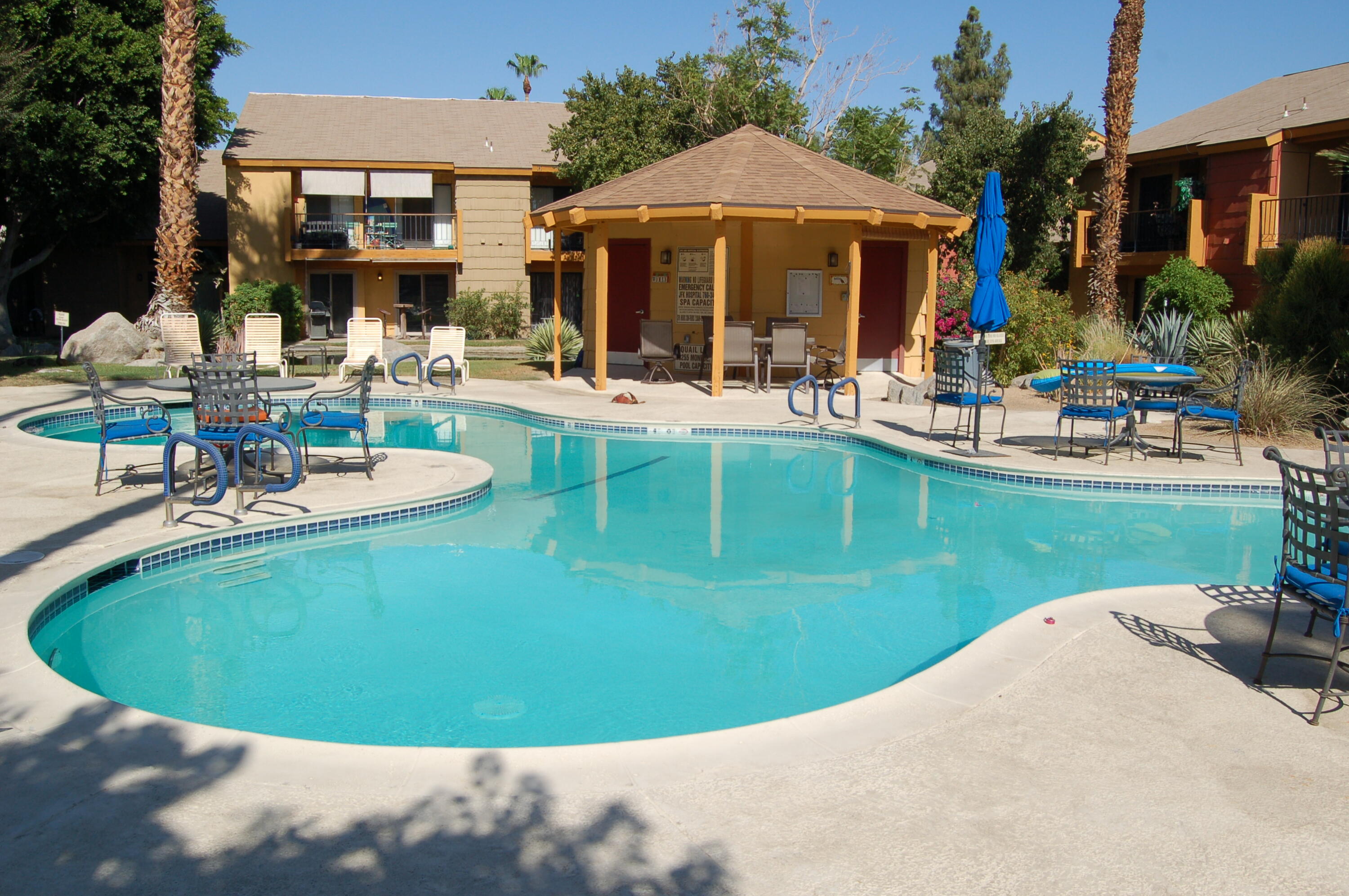 48255 Monroe Street, Unit 6 Indio, CA 92201 - Photo 37 of 43 a view of a house with sitting area and furniture