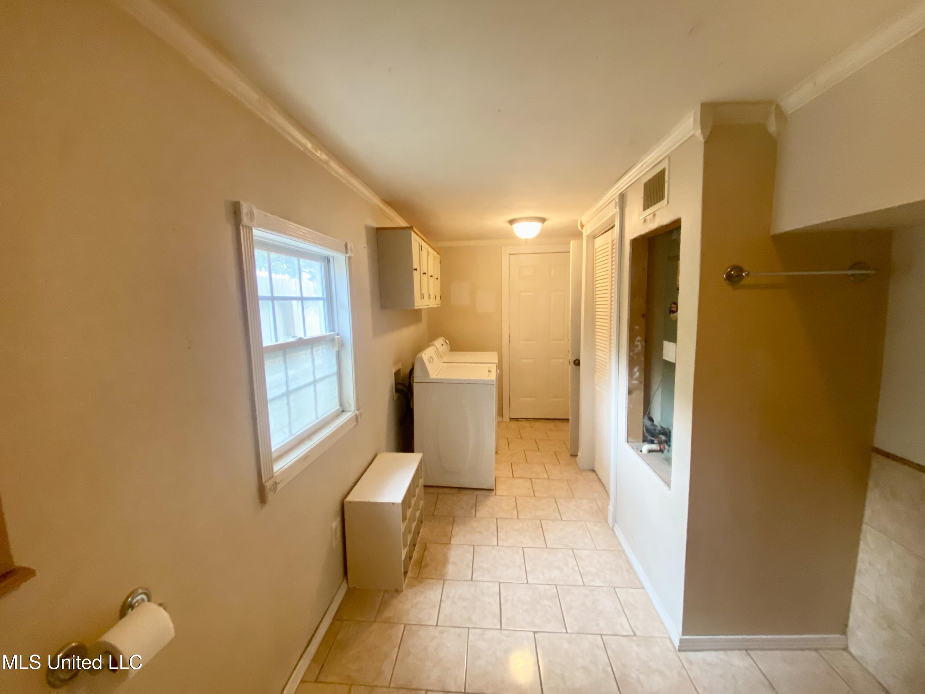 119 Dampeer Street Crystal Springs, MS 39059 - Photo 11 of 23 119 Dampeer Street Laundry Area