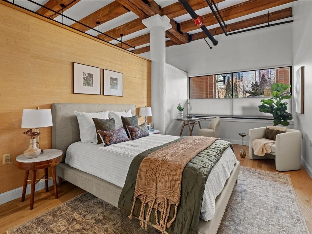 33 Sleeper Street, Unit 104 Boston, MA 02210 - Photo 11 of 23 a bedroom with bed and a window