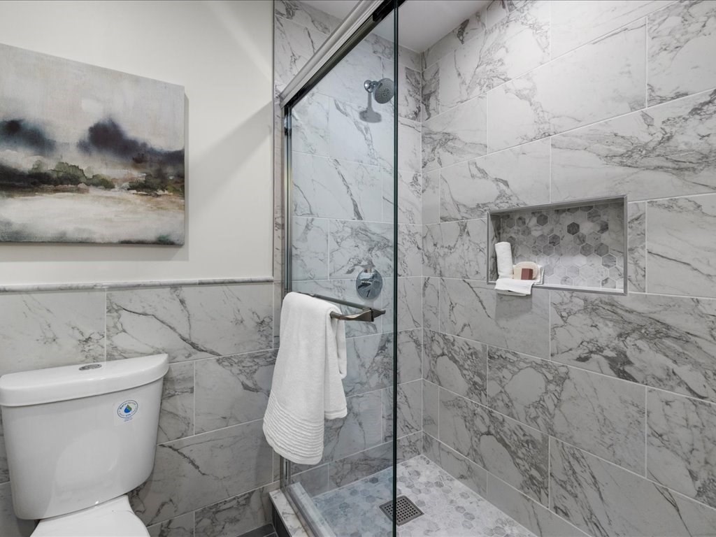 33 Sleeper Street, Unit 104 Boston, MA 02210 - Photo 16 of 23 a bathroom with a toilet and shower