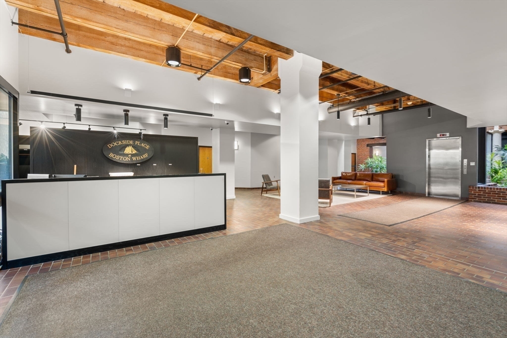 33 Sleeper Street, Unit 104 Boston, MA 02210 - Photo 20 of 23 a view of a big room with a kitchen