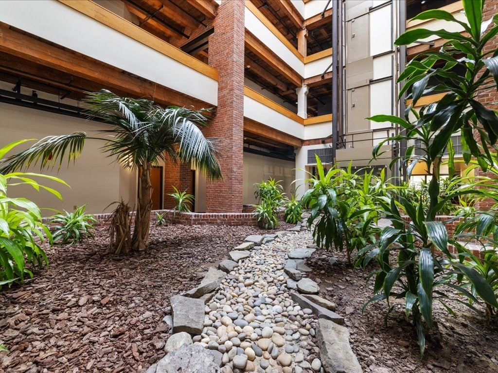 33 Sleeper Street, Unit 104 Boston, MA 02210 - Photo 22 of 23 a view of a palm trees front of house