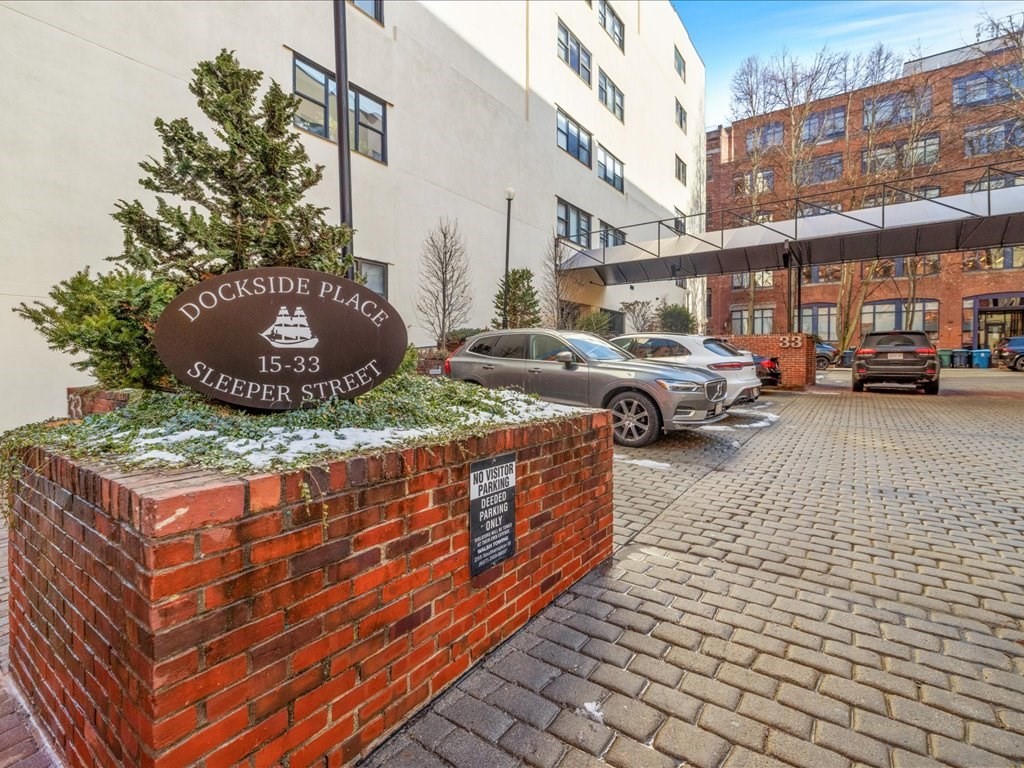 33 Sleeper Street, Unit 104 Boston, MA 02210 - Photo 23 of 23 a cars parked on the side of a street
