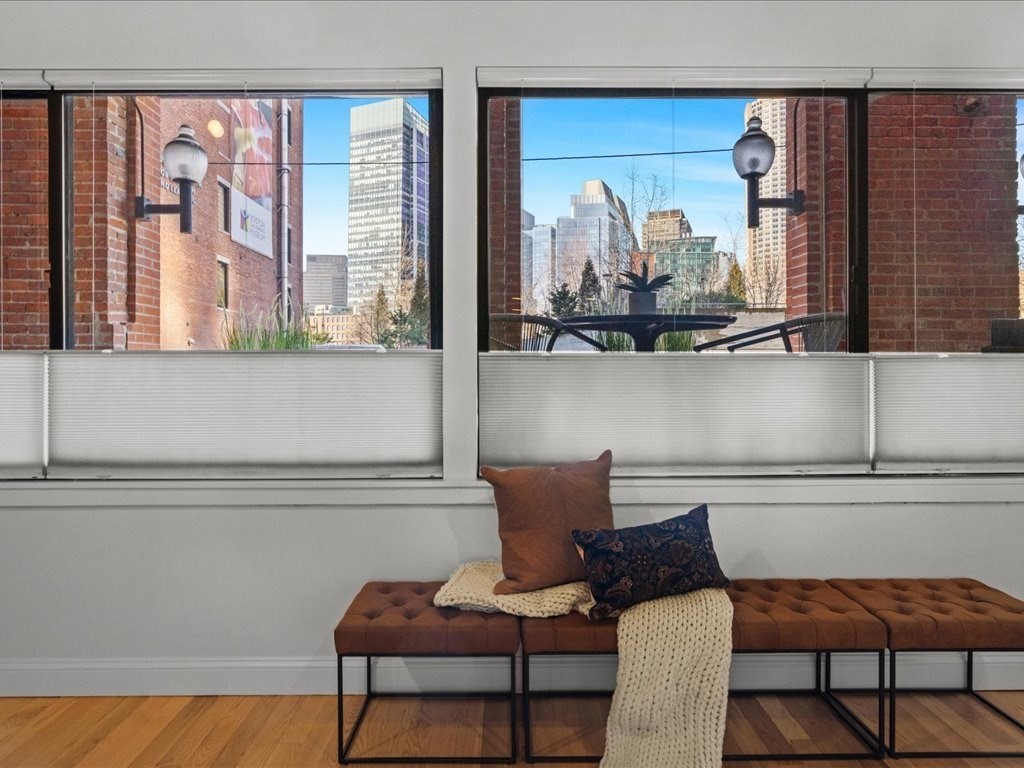 33 Sleeper Street, Unit 104 Boston, MA 02210 - Photo 7 of 23 a dining room with furniture and window