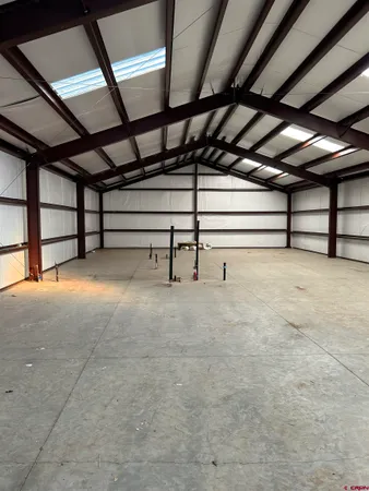 a view of a big yard with lots of green space