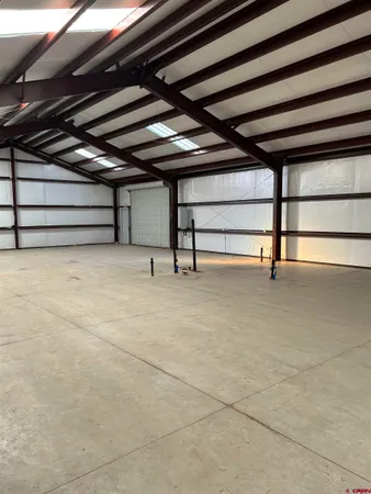 a view of a yard with an outdoor space and seating area
