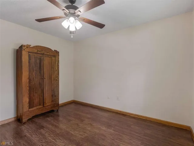 a living room with fireplace furniture and a flat screen tv