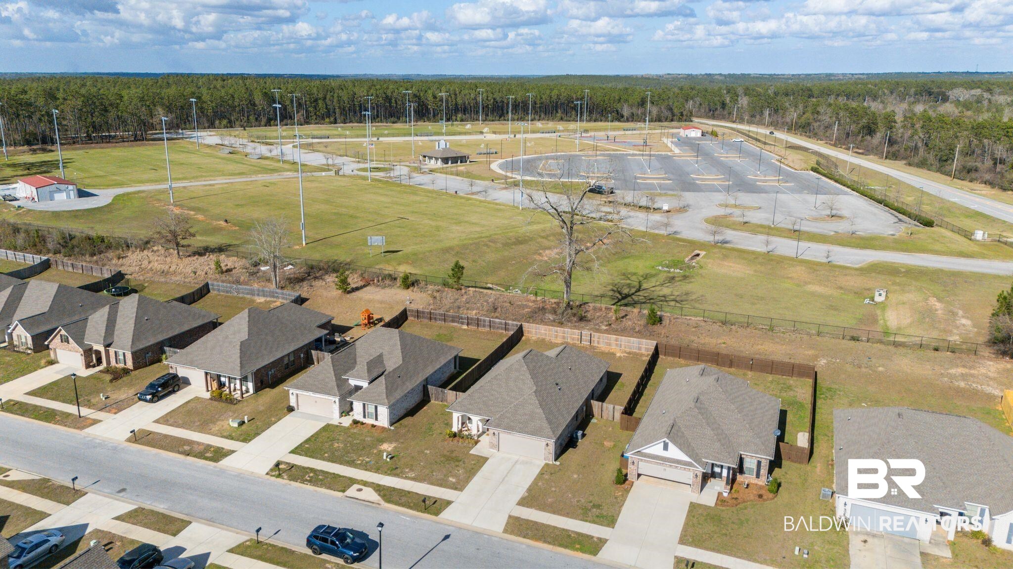 10745 Brodick Loop Daphne, AL 36527 - Photo 31 of 39 Aerial view of residential area with a forest
