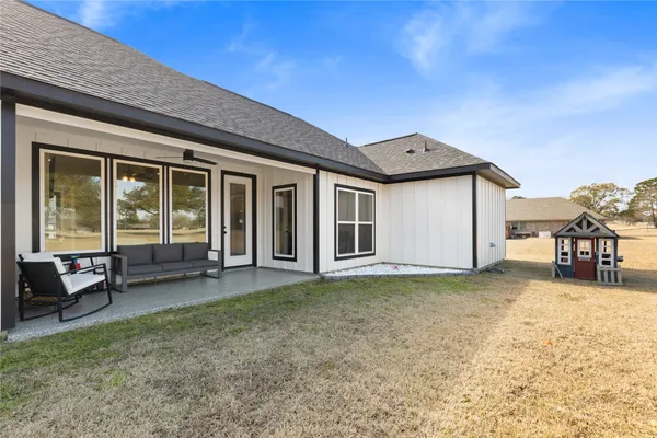 a house view with a outdoor space