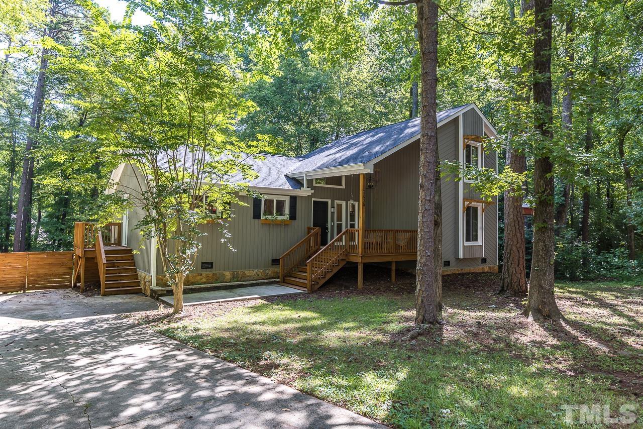 7929 Kingsland Drive Raleigh, NC 27613 - Photo 2 of 46 a view of a house with backyard