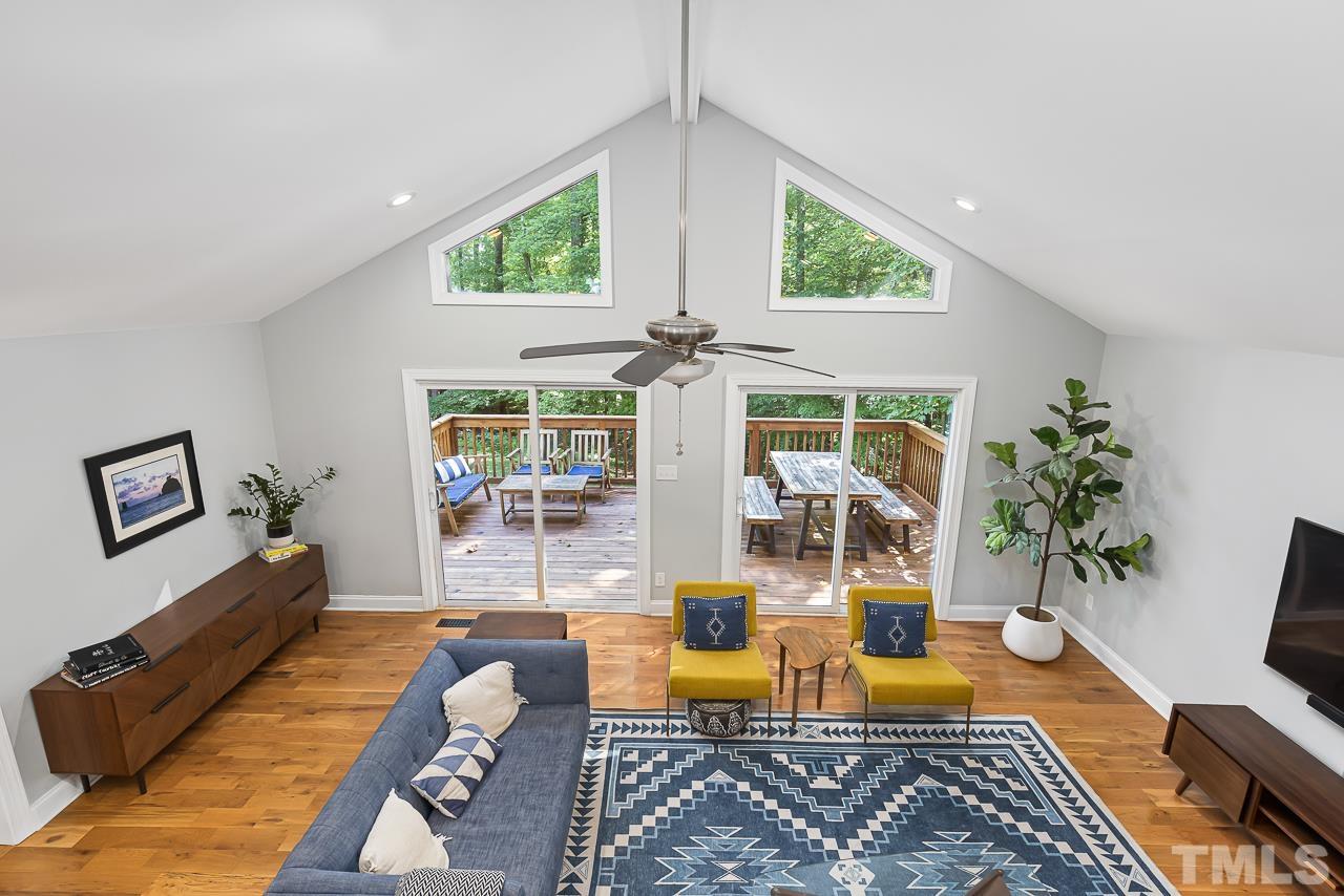7929 Kingsland Drive Raleigh, NC 27613 - Photo 23 of 46 a living room with furniture and a large window