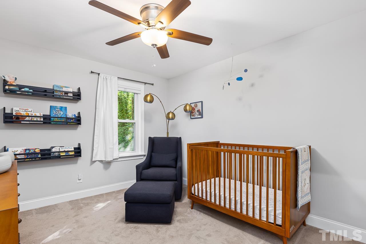 7929 Kingsland Drive Raleigh, NC 27613 - Photo 25 of 46 a living room with furniture and kitchen view