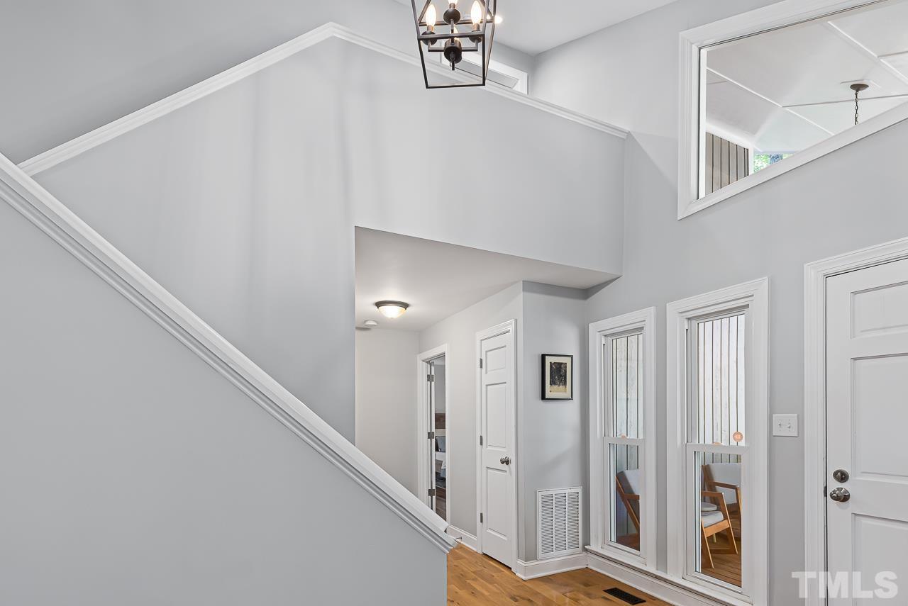 7929 Kingsland Drive Raleigh, NC 27613 - Photo 3 of 46 a view of a hallway with entryway