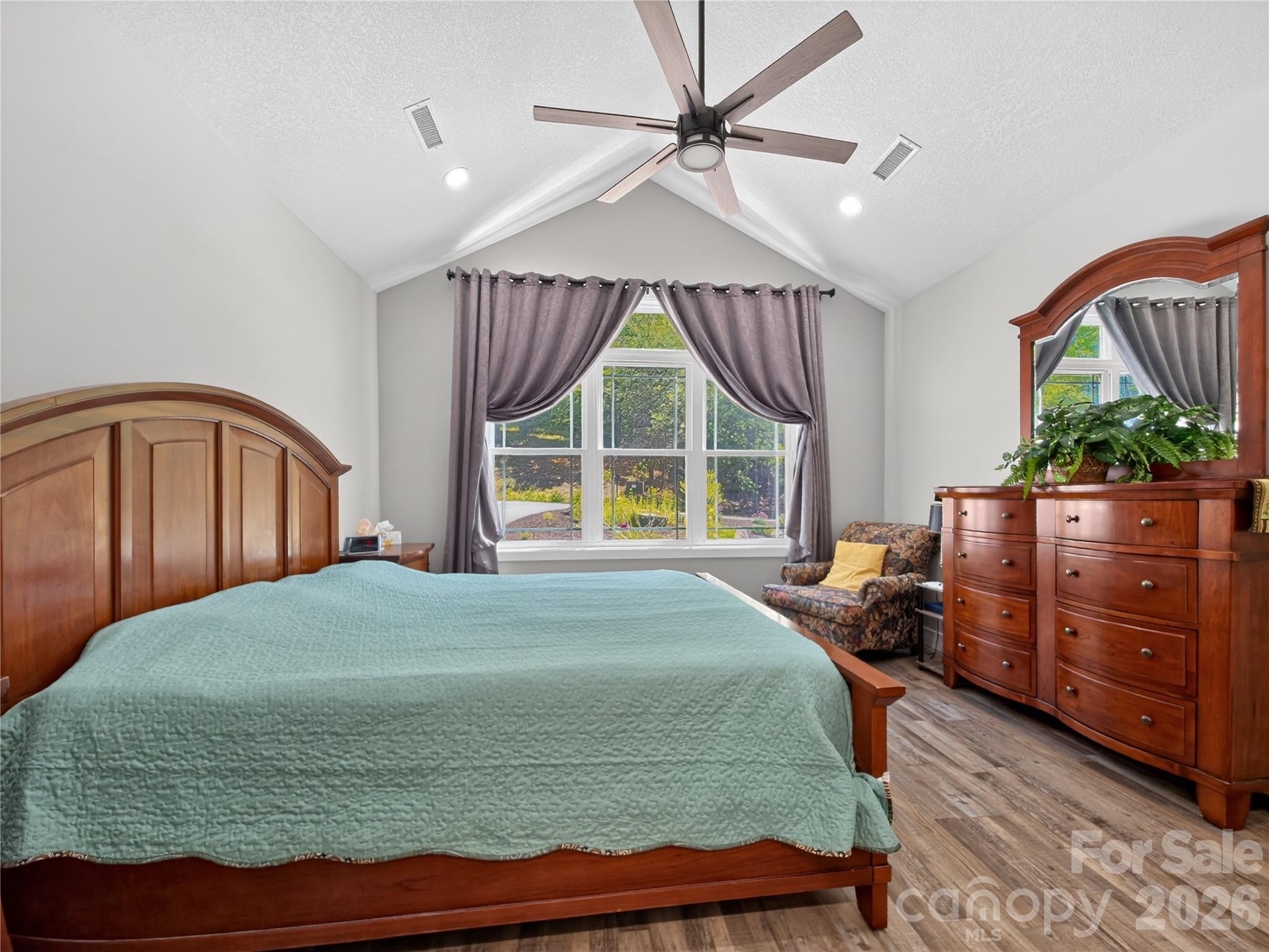 278 Hunters Trace Rutherfordton, NC 28139 - Photo 10 of 33 a bedroom with a bed and a large window