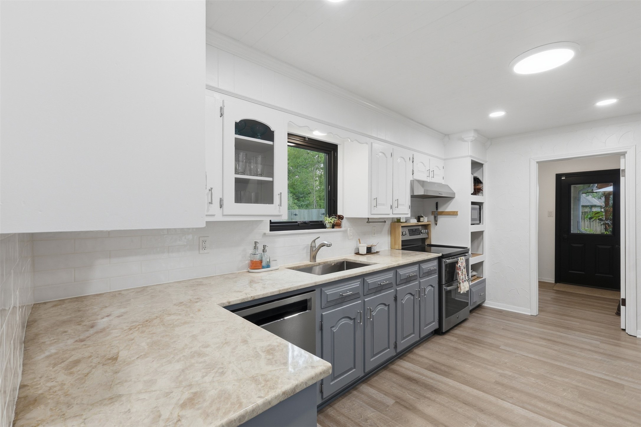 6126 Hickorycrest Drive Spring, TX 77389 - Photo 16 of 50 Kitchen view with plenty of counter space and a window over the sink for natural light.