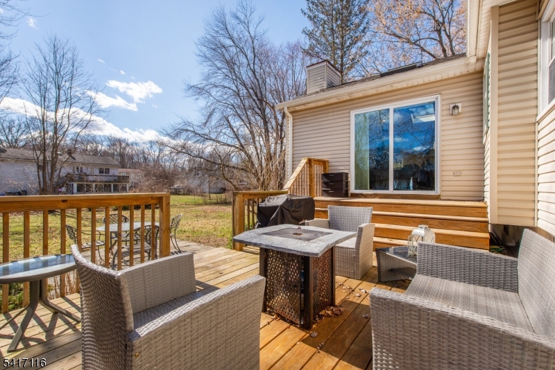 29 Long Acres Road Fairfield, NJ 07004 - Photo 30 of 33 a view of a patio with couches table and chairs