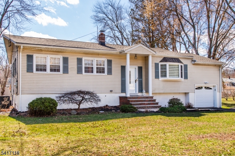 29 Long Acres Road Fairfield, NJ 07004 - Photo 33 of 33 a front view of a house with swimming pool and porch