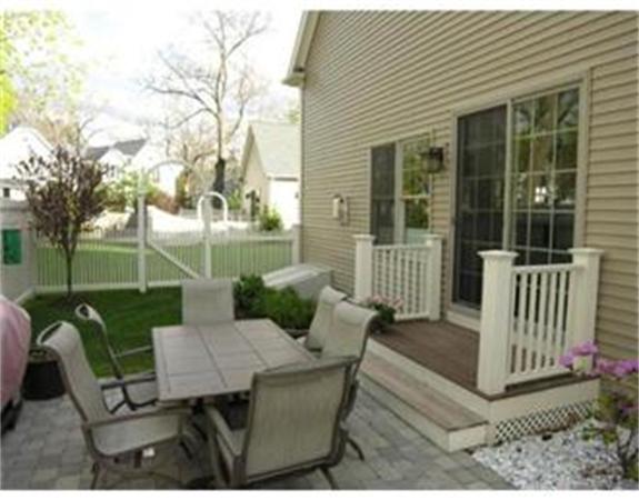 46 Maple Street Needham, MA 02492 - Photo 11 of 12 a view of a house with backyard and porch
