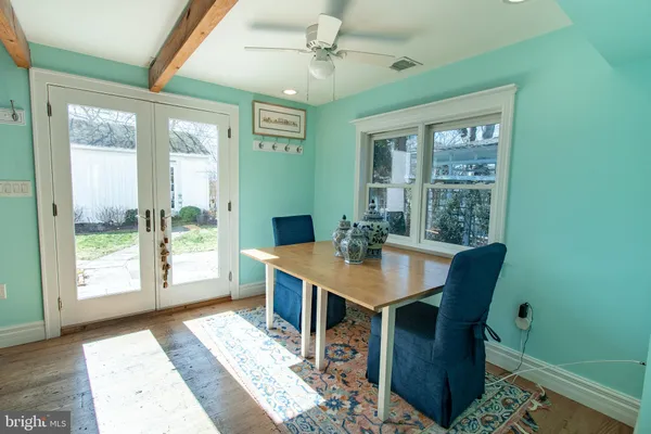 a spacious bedroom with a bed and a fireplace