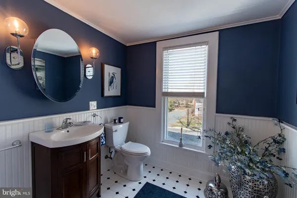 a front view of house with yard and entertaining space