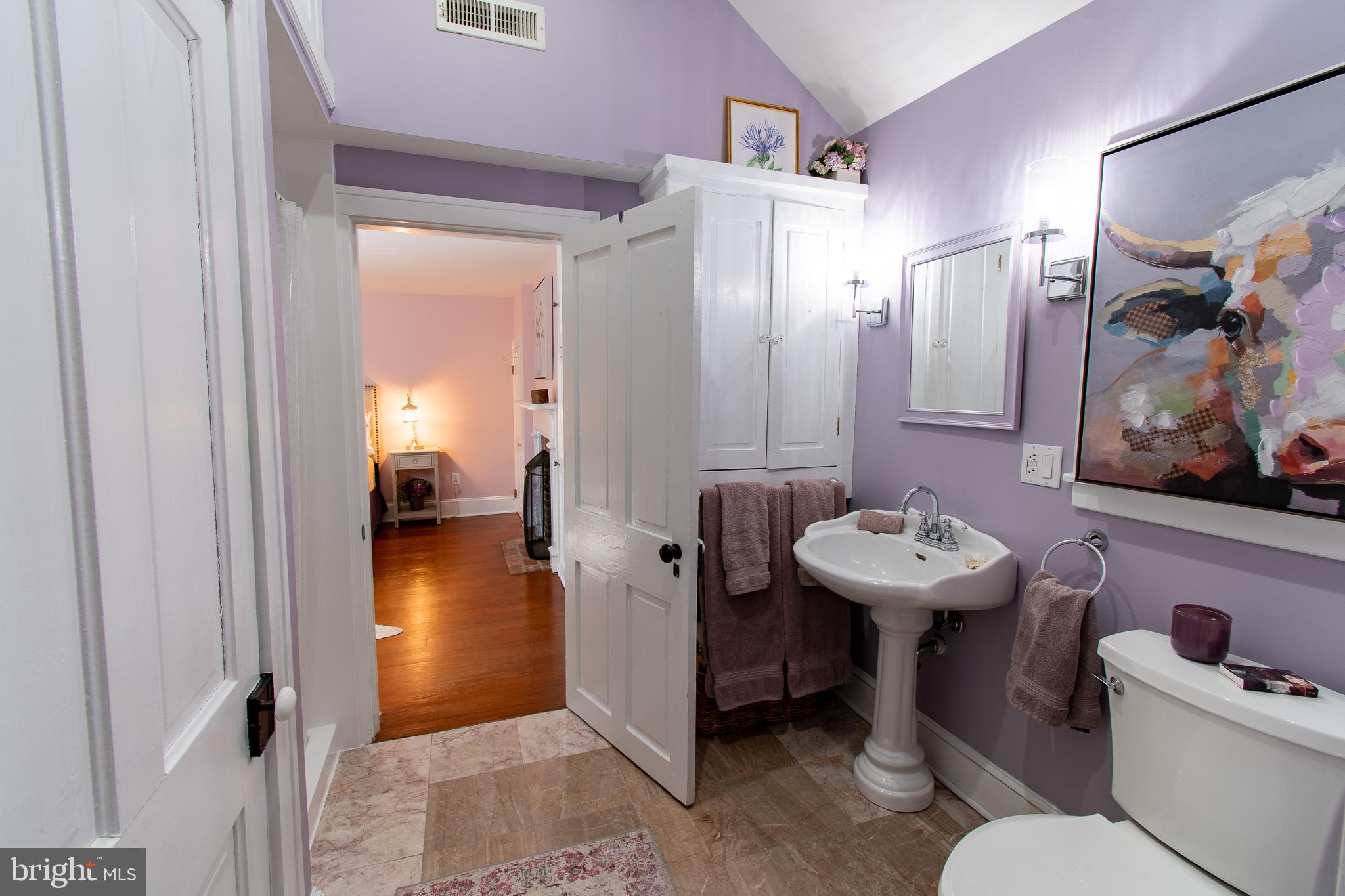 114 West Chestnut Street St. Michaels, MD 21663 - Photo 28 of 75 a bathroom with a sink toilet and shower
