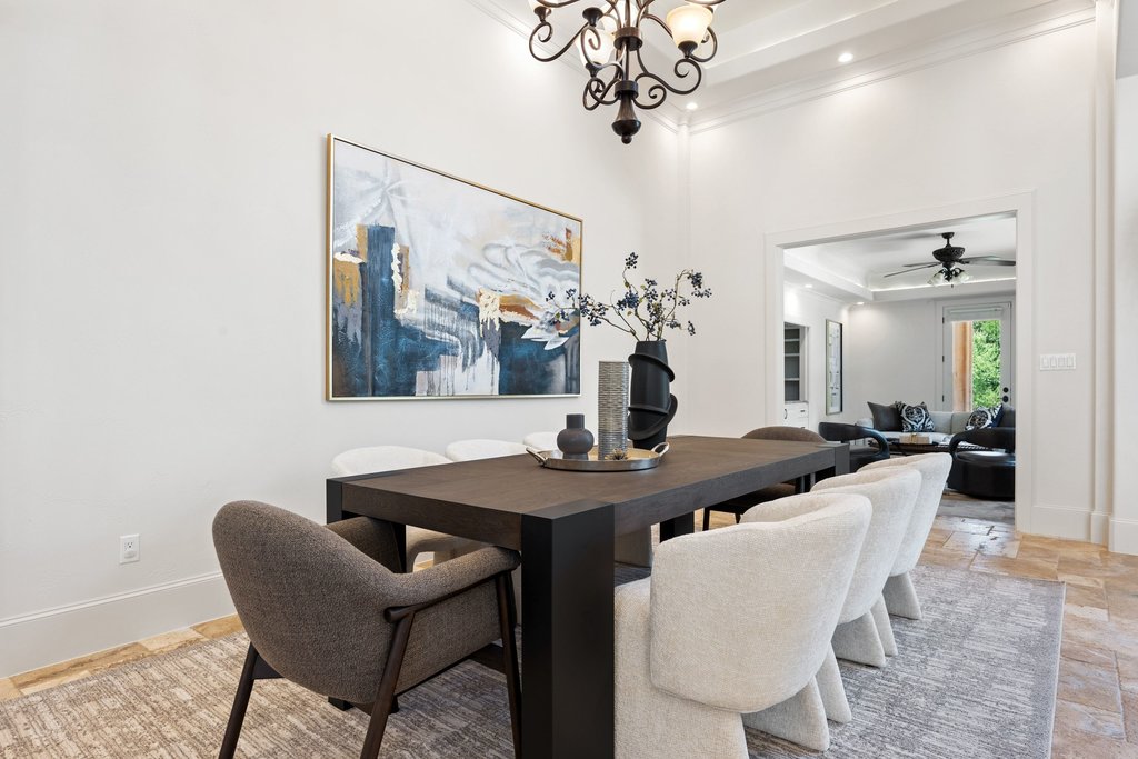 102 Long Point Cove Georgetown, TX 78628 - Photo 12 of 36 a view of a dining room with furniture and chandelier