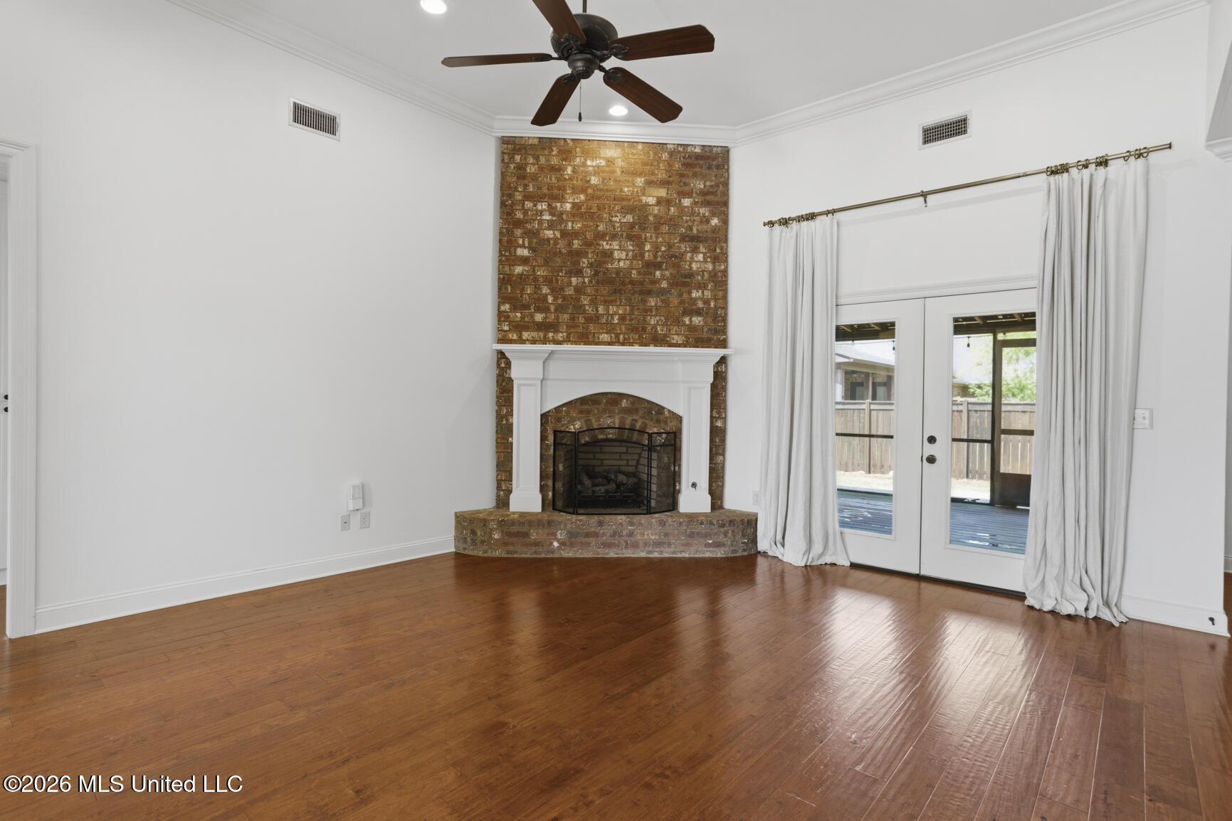 303 Siltstone Ridge Brandon, MS 39047 - Photo 10 of 37 Living Room with Brick Hearth F/P