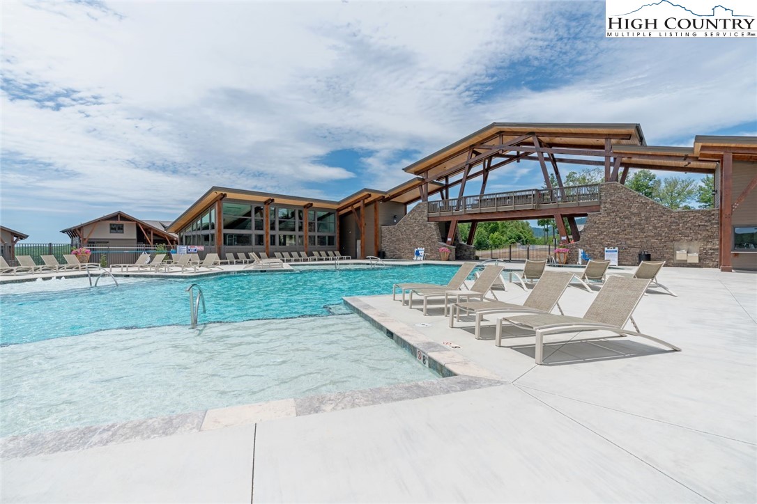 190 Still Lake Drive, Unit 321 Boone, NC 28607 - Photo 29 of 30 a front view of a house with garden