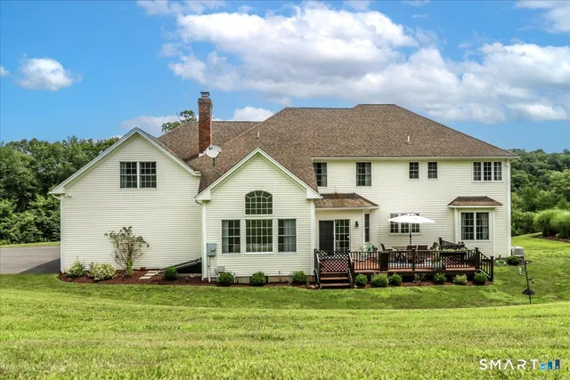a view of a garden with a building