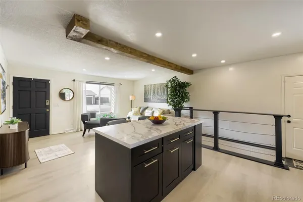 a kitchen with a stove and a sink