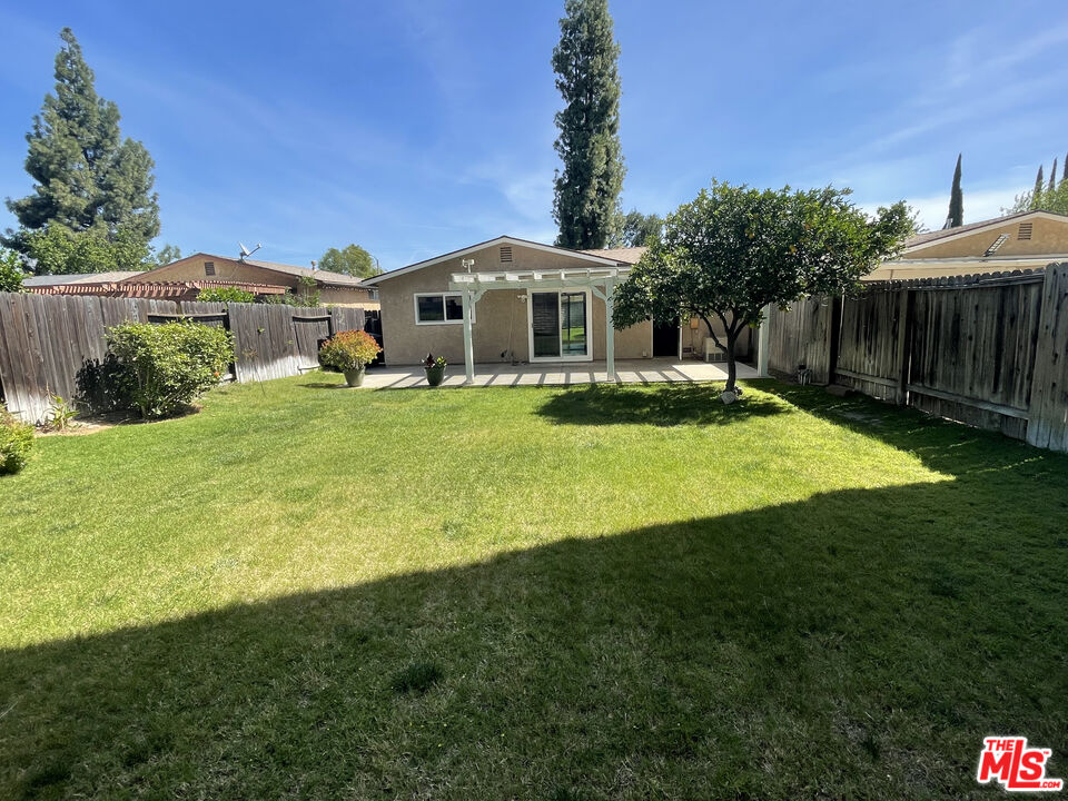 1793 Moreno Drive Simi Valley, CA 93063 - Photo 3 of 13 a front view of a house with garden