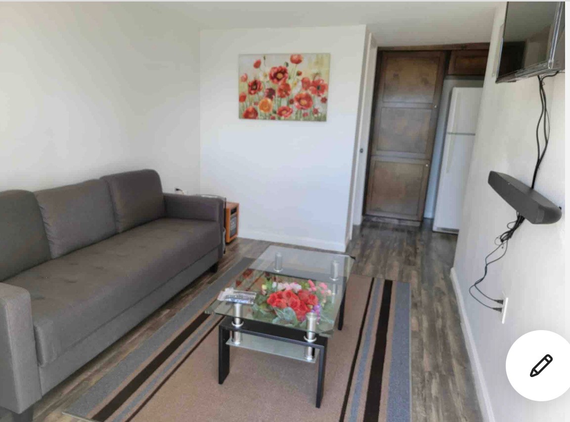8041 Howard Drive, Unit 2 Houston, TX 77017 - Photo 4 of 6 a living room with furniture and a rug