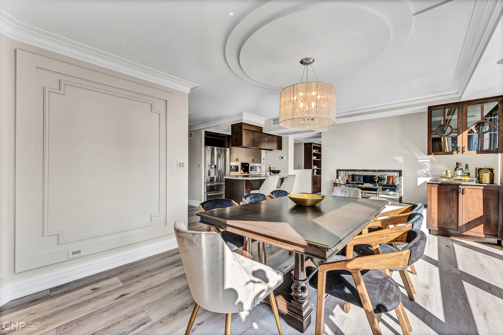 21 West Goethe Street, Unit 10G Chicago, IL 60610 - Photo 15 of 39 a view of a dining room with furniture and chandelier
