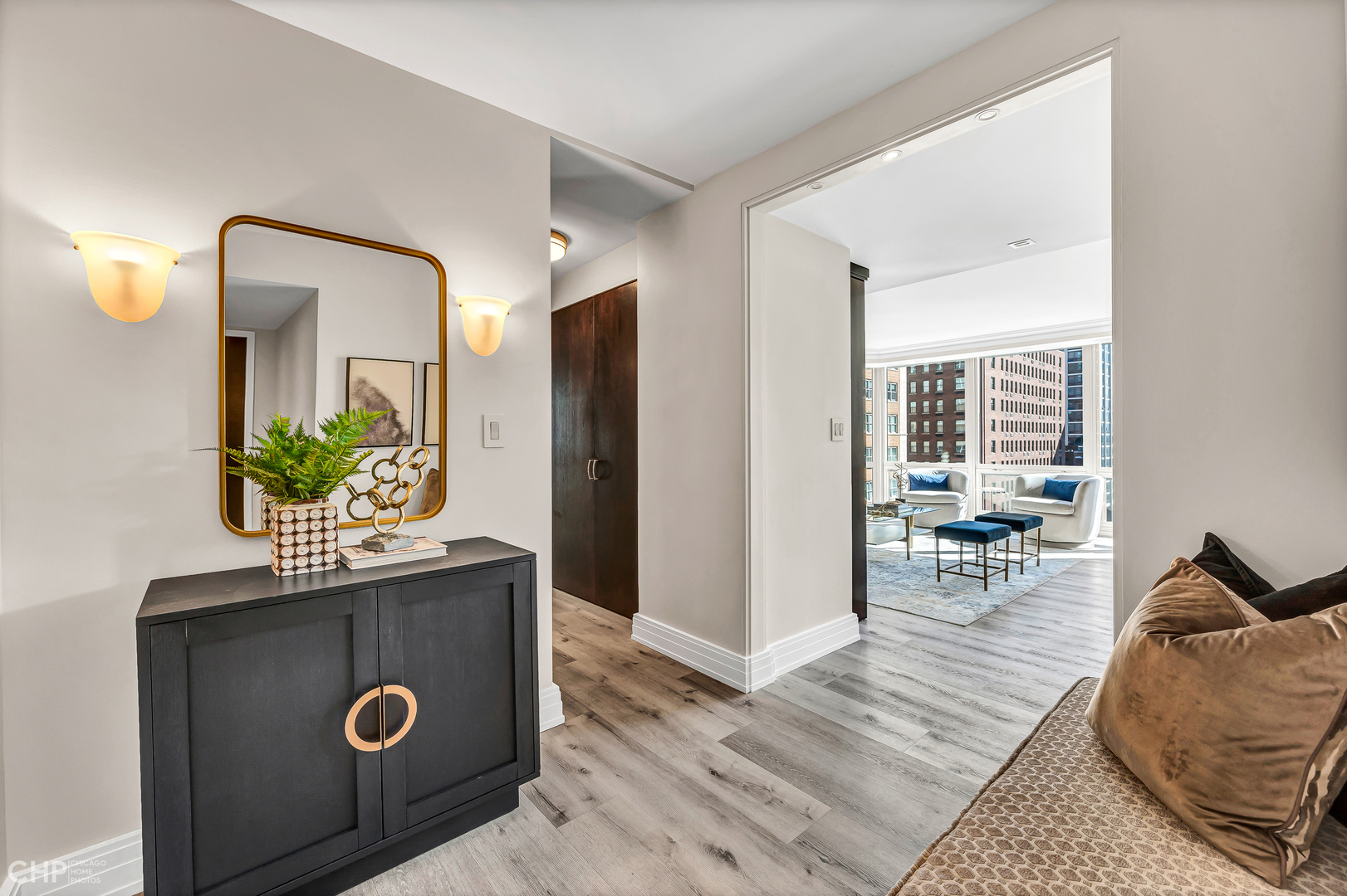 21 West Goethe Street, Unit 10G Chicago, IL 60610 - Photo 2 of 39 a view of living room with furniture and wooden floor
