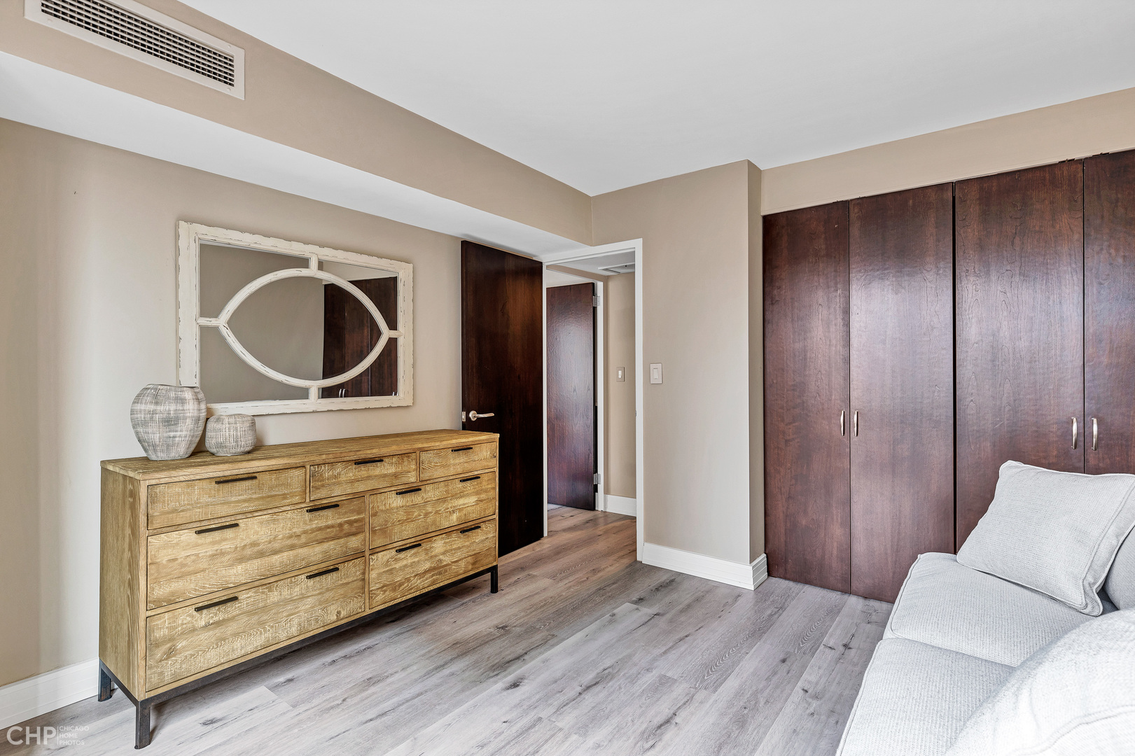 21 West Goethe Street, Unit 10G Chicago, IL 60610 - Photo 28 of 39 a room with furniture and baby crib