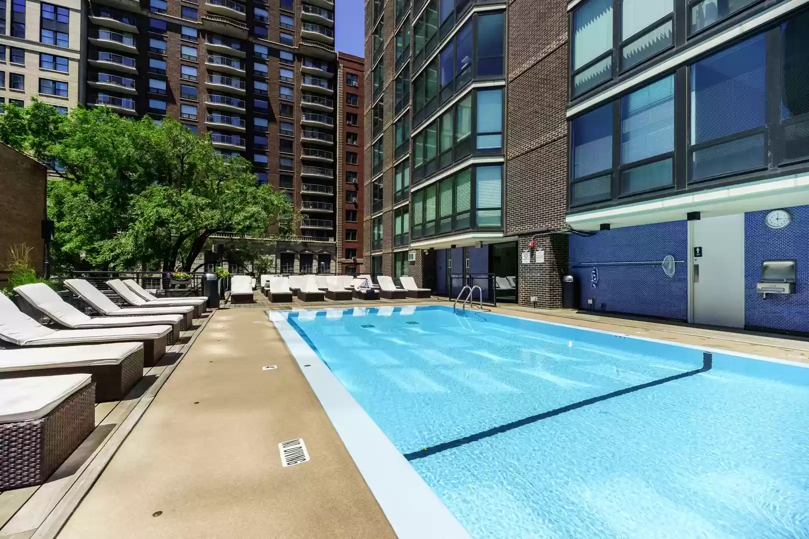 21 West Goethe Street, Unit 10G Chicago, IL 60610 - Photo 33 of 39 a swimming pool with outdoor seating and yard