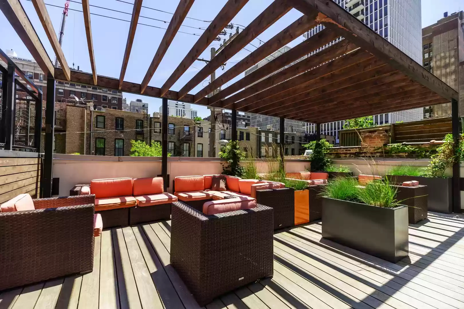 21 West Goethe Street, Unit 10G Chicago, IL 60610 - Photo 35 of 39 a view of a patio with table and chairs and potted plants