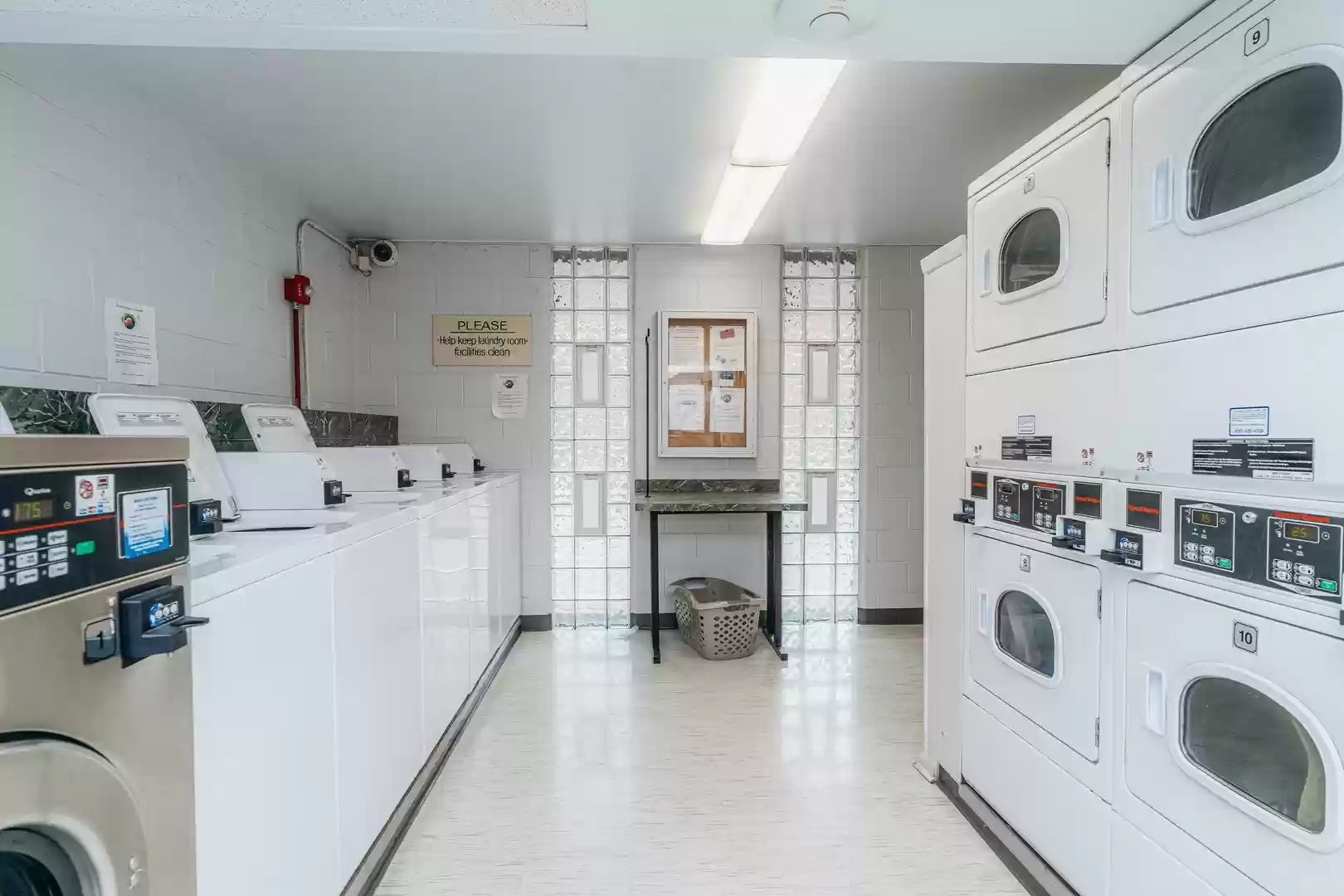 21 West Goethe Street, Unit 10G Chicago, IL 60610 - Photo 38 of 39 a kitchen with refrigerator a stove and cabinets