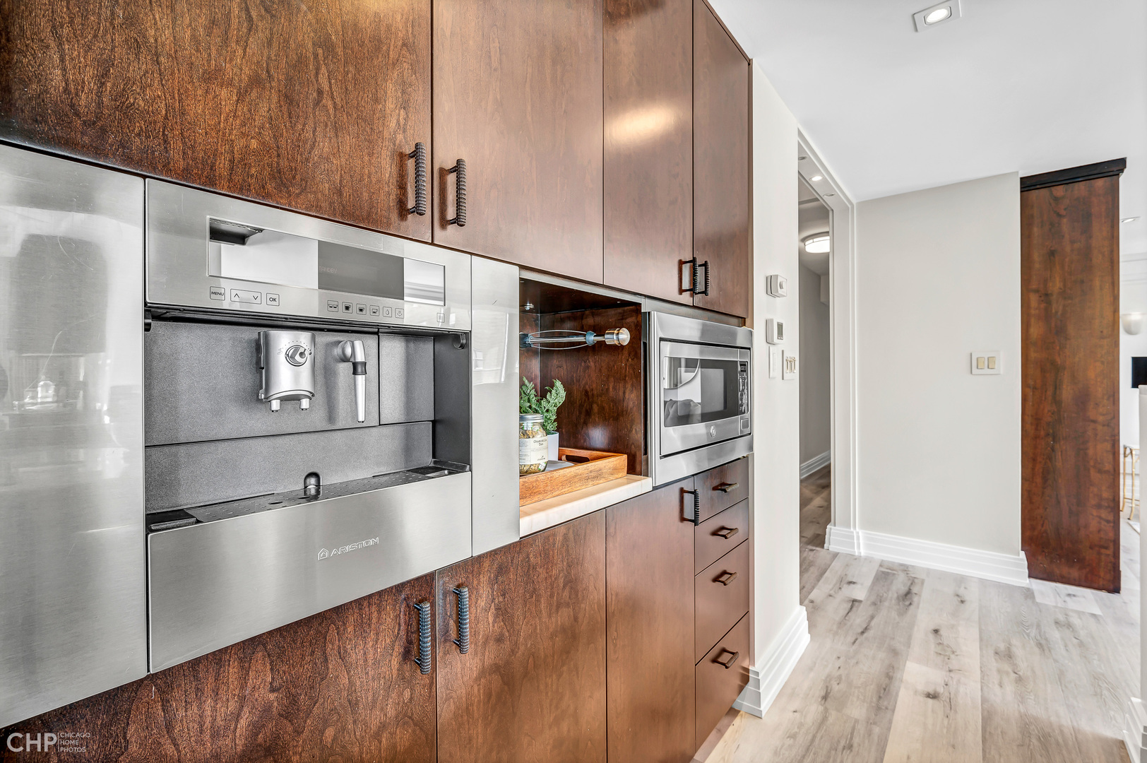 21 West Goethe Street, Unit 10G Chicago, IL 60610 - Photo 8 of 39 a kitchen with stainless steel appliances granite countertop a refrigerator and a sink