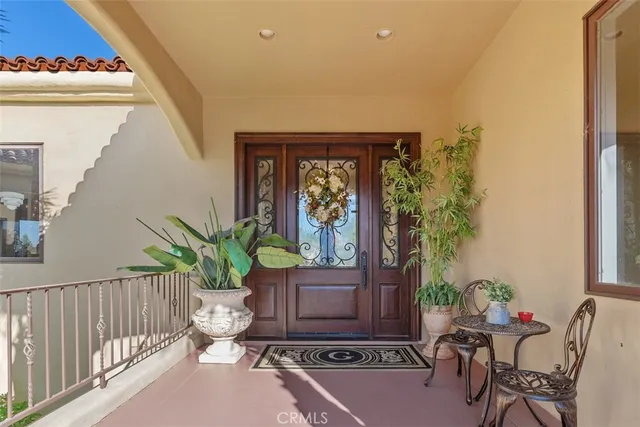 a view of a balcony with furniture