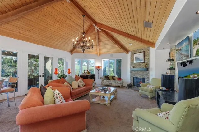 a kitchen with stainless steel appliances granite countertop a sink and a stove