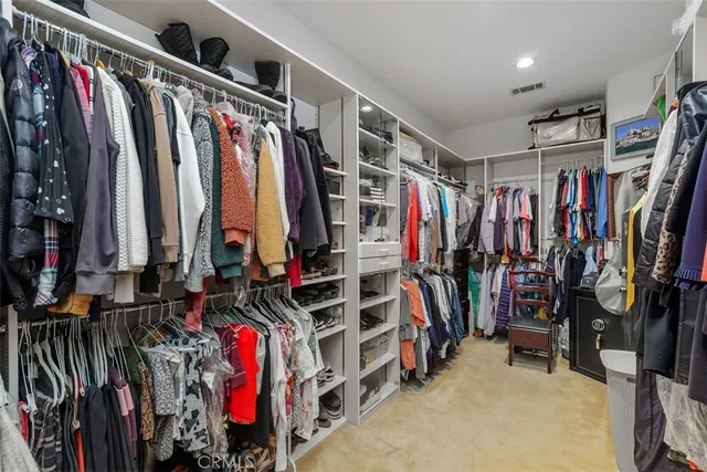 a view of living room with furniture and garden view
