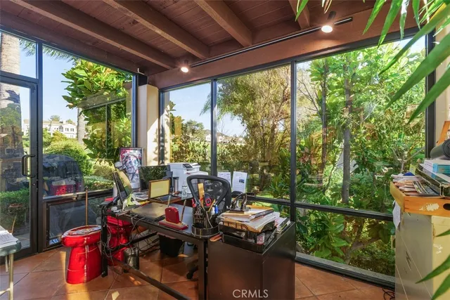 a swimming pool with outdoor seating and yard