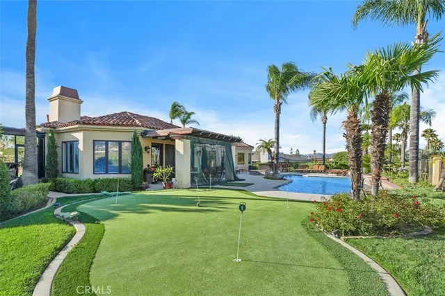 a view of a big yard with a tree