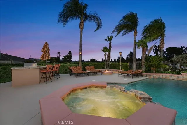 a view of a town with large trees