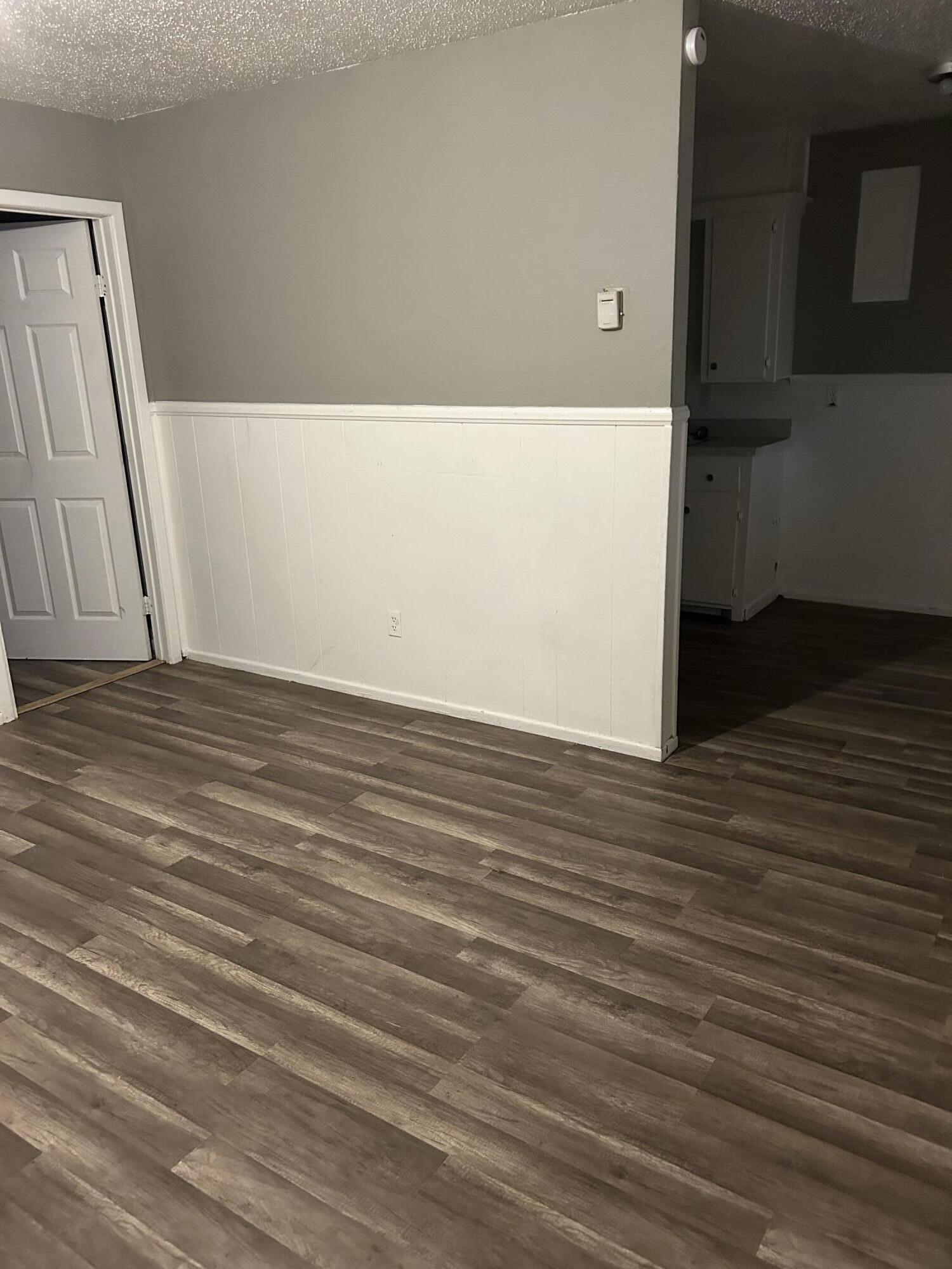 1102 42nd Street Lubbock, TX 79412 - Photo 6 of 16 a view of a room with wooden floor
